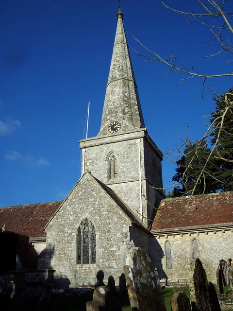 Central tower, broach spire and south transept of St Margaret of Antioch parish church, Chilmark, Wiltshire, England