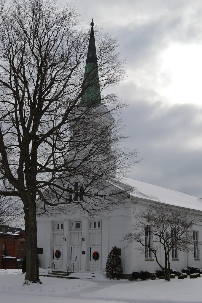 Front and western side of the First Congregational Church of Cuyahoga Falls, located at 130 Broad Boulevard in Cuyahoga Falls, Ohio, United States. Built in 1847, it is listed on the National Register of Historic Places.