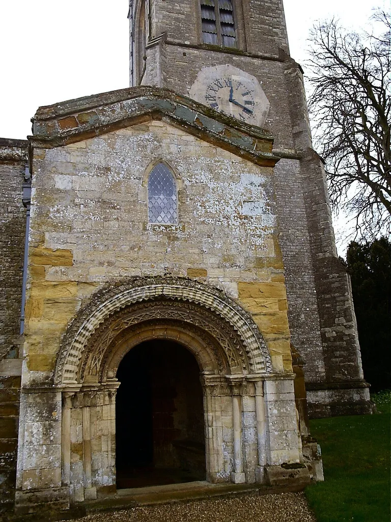 Porch of St Mary Magdalene parish church, Castle Ashby, Northamptonshire: the arch is late Norman, and there is a room over the porch