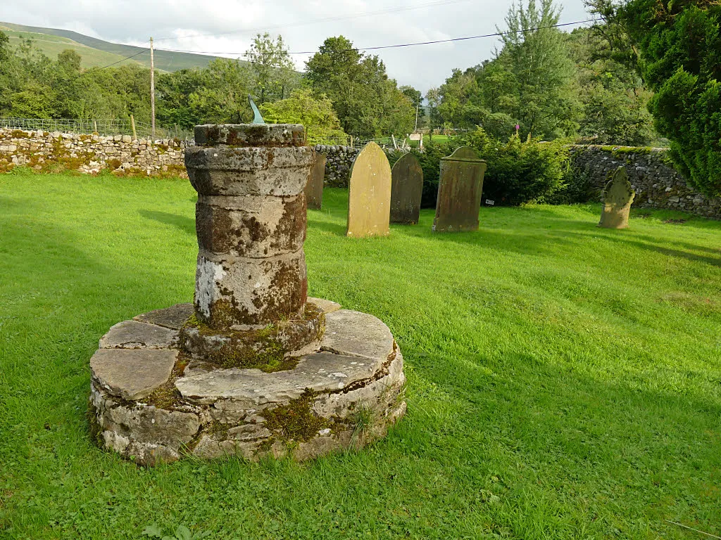 Photograph of the sundial in the churchyard of St Michael's Church, Hubberholme, North Yorkshire, England