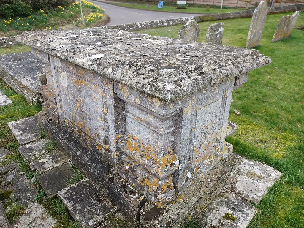 Table Tomb 5 Metres North Of Church Of All Saints, Barton Stacey, Hampshire, England. Early 19th century, Grade II listed. .mw-parser-output .messagebox{margin:4px 0;width:auto;border-collapse:collapse;border:2px solid var(--border-color-progressive,#6485d1);background-color:var(--background-color-neutral-subtle,#fbfcff);color:var(--color-base,#202122);box-sizing:border-box;border-inline-start-width:8px}.mw-parser-output .messagebox.mbox-small{font-size:88%;line-height:1.25em}.mw-parser-output .mbox-warning,.mw-parser-output .mbox-speedy{border:2px solid var(--border-color-error,#b22222);background:var(--background-color-error-subtle,#ffdbdb);border-inline-start-width:8px}.mw-parser-output .mbox-serious,.mw-parser-output .mbox-delete,.mw-parser-output .mbox-stop{border:2px solid var(--border-color-error,#b22222);border-inline-start-width:8px}.mw-parser-output .mbox-issue,.mw-parser-output .mbox-content{border:2px solid #f28500;background:var(--background-color-warning-subtle,#ffe);border-inline-start-width:8px}.mw-parser-output .mbox-query,.mw-parser-output .mbox-style{border:2px solid #f4c430;background:var(--background-color-warning-subtle,#ffe);border-inline-start-width:8px}.mw-parser-output .mbox-shit{border:2px solid #960;border-inline-start-width:8px}.mw-parser-output .mbox-license{border:2px solid #88a;border-inline-start-width:initial}.mw-parser-output .mbox-legal{border:2px solid var(--border-color-notice,#666);background:var(--background-color-base,#fff);border-inline-start-width:8px}.mw-parser-output .mbox-honor{border:2px solid #ca3;background:var(--background-color-warning-subtle,#fcf4db);border-inline-start-width:8px}.mw-parser-output .mbox-growth{border:2px solid #8d4;background:var(--background-color-success-subtle,#d5fdf4);border-inline-start-width:8px}.mw-parser-output .mbox-move{border:2px solid #93c;border-inline-start-width:8px}.mw-parser-output .mbox-protection,.mw-parser-output .mbox-message{border:2px solid var(--border-color-base,#aaa);borde