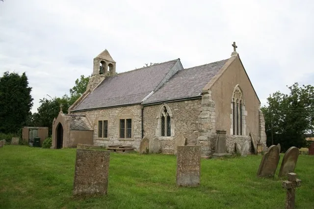 St.Peter's church, Stokeham. Early English and Decorated windows except for the blocked south arcade, demolished in the 18th century.