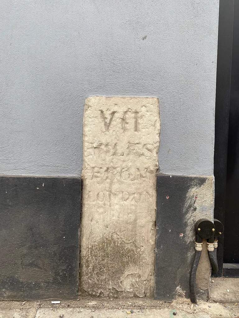 Milestone (London 7) On Wall Of Number 161 Brent Street Between Church Road And Lodge Road .mw-parser-output .messagebox{margin:4px 0;width:auto;border-collapse:collapse;border:2px solid var(--border-color-progressive,#6485d1);background-color:var(--background-color-neutral-subtle,#fbfcff);color:var(--color-base,#202122);box-sizing:border-box;border-inline-start-width:8px}.mw-parser-output .messagebox.mbox-small{font-size:88%;line-height:1.25em}.mw-parser-output .mbox-warning,.mw-parser-output .mbox-speedy{border:2px solid var(--border-color-error,#b22222);background:var(--background-color-error-subtle,#ffdbdb);border-inline-start-width:8px}.mw-parser-output .mbox-serious,.mw-parser-output .mbox-delete,.mw-parser-output .mbox-stop{border:2px solid var(--border-color-error,#b22222);border-inline-start-width:8px}.mw-parser-output .mbox-issue,.mw-parser-output .mbox-content{border:2px solid #f28500;background:var(--background-color-warning-subtle,#ffe);border-inline-start-width:8px}.mw-parser-output .mbox-query,.mw-parser-output .mbox-style{border:2px solid #f4c430;background:var(--background-color-warning-subtle,#ffe);border-inline-start-width:8px}.mw-parser-output .mbox-shit{border:2px solid #960;border-inline-start-width:8px}.mw-parser-output .mbox-license{border:2px solid #88a;border-inline-start-width:initial}.mw-parser-output .mbox-legal{border:2px solid var(--border-color-notice,#666);background:var(--background-color-base,#fff);border-inline-start-width:8px}.mw-parser-output .mbox-honor{border:2px solid #ca3;background:var(--background-color-warning-subtle,#fcf4db);border-inline-start-width:8px}.mw-parser-output .mbox-growth{border:2px solid #8d4;background:var(--background-color-success-subtle,#d5fdf4);border-inline-start-width:8px}.mw-parser-output .mbox-move{border:2px solid #93c;border-inline-start-width:8px}.mw-parser-output .mbox-protection,.mw-parser-output .mbox-message{border:2px solid var(--border-color-base,#aaa);border-inline-start-width:8px}.mw-par