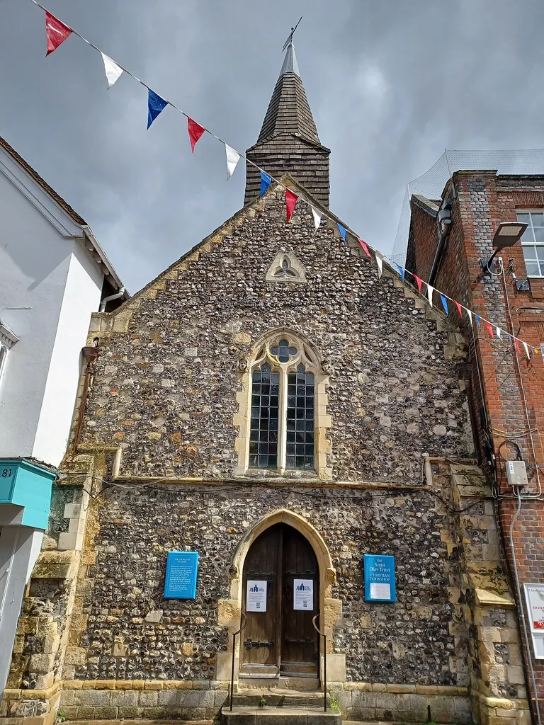 The Former Church Of St Olave, North Street, Chichester, West Sussex, England. 11th to 13th centuries, Grade I listed. .mw-parser-output .messagebox{margin:4px 0;width:auto;border-collapse:collapse;border:2px solid var(--border-color-progressive,#6485d1);background-color:var(--background-color-neutral-subtle,#fbfcff);color:var(--color-base,#202122);box-sizing:border-box;border-inline-start-width:8px}.mw-parser-output .messagebox.mbox-small{font-size:88%;line-height:1.25em}.mw-parser-output .mbox-warning,.mw-parser-output .mbox-speedy{border:2px solid var(--border-color-error,#b22222);background:var(--background-color-error-subtle,#ffdbdb);border-inline-start-width:8px}.mw-parser-output .mbox-serious,.mw-parser-output .mbox-delete,.mw-parser-output .mbox-stop{border:2px solid var(--border-color-error,#b22222);border-inline-start-width:8px}.mw-parser-output .mbox-issue,.mw-parser-output .mbox-content{border:2px solid #f28500;background:var(--background-color-warning-subtle,#ffe);border-inline-start-width:8px}.mw-parser-output .mbox-query,.mw-parser-output .mbox-style{border:2px solid #f4c430;background:var(--background-color-warning-subtle,#ffe);border-inline-start-width:8px}.mw-parser-output .mbox-shit{border:2px solid #960;border-inline-start-width:8px}.mw-parser-output .mbox-license{border:2px solid #88a;border-inline-start-width:initial}.mw-parser-output .mbox-legal{border:2px solid var(--border-color-notice,#666);background:var(--background-color-base,#fff);border-inline-start-width:8px}.mw-parser-output .mbox-honor{border:2px solid #ca3;background:var(--background-color-warning-subtle,#fcf4db);border-inline-start-width:8px}.mw-parser-output .mbox-growth{border:2px solid #8d4;background:var(--background-color-success-subtle,#d5fdf4);border-inline-start-width:8px}.mw-parser-output .mbox-move{border:2px solid #93c;border-inline-start-width:8px}.mw-parser-output .mbox-protection,.mw-parser-output .mbox-message{border:2px solid var(--border-color-base,#aaa);border-in