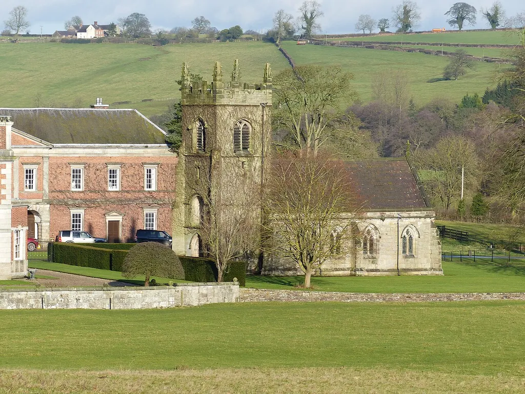 Church of All Saints, Okeover: Grade II* listed church at Okeover Hall, Staffordshire .mw-parser-output .messagebox{margin:4px 0;width:auto;border-collapse:collapse;border:2px solid var(--border-color-progressive,#6485d1);background-color:var(--background-color-neutral-subtle,#fbfcff);color:var(--color-base,#202122);box-sizing:border-box;border-inline-start-width:8px}.mw-parser-output .messagebox.mbox-small{font-size:88%;line-height:1.25em}.mw-parser-output .mbox-warning,.mw-parser-output .mbox-speedy{border:2px solid var(--border-color-error,#b22222);background:var(--background-color-error-subtle,#ffdbdb);border-inline-start-width:8px}.mw-parser-output .mbox-serious,.mw-parser-output .mbox-delete,.mw-parser-output .mbox-stop{border:2px solid var(--border-color-error,#b22222);border-inline-start-width:8px}.mw-parser-output .mbox-issue,.mw-parser-output .mbox-content{border:2px solid #f28500;background:var(--background-color-warning-subtle,#ffe);border-inline-start-width:8px}.mw-parser-output .mbox-query,.mw-parser-output .mbox-style{border:2px solid #f4c430;background:var(--background-color-warning-subtle,#ffe);border-inline-start-width:8px}.mw-parser-output .mbox-shit{border:2px solid #960;border-inline-start-width:8px}.mw-parser-output .mbox-license{border:2px solid #88a;border-inline-start-width:initial}.mw-parser-output .mbox-legal{border:2px solid var(--border-color-notice,#666);background:var(--background-color-base,#fff);border-inline-start-width:8px}.mw-parser-output .mbox-honor{border:2px solid #ca3;background:var(--background-color-warning-subtle,#fcf4db);border-inline-start-width:8px}.mw-parser-output .mbox-growth{border:2px solid #8d4;background:var(--background-color-success-subtle,#d5fdf4);border-inline-start-width:8px}.mw-parser-output .mbox-move{border:2px solid #93c;border-inline-start-width:8px}.mw-parser-output .mbox-protection,.mw-parser-output .mbox-message{border:2px solid var(--border-color-base,#aaa);border-inline-start-width:8px}.mw-parser-o