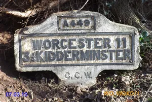 Milestone, N of old railway bridge