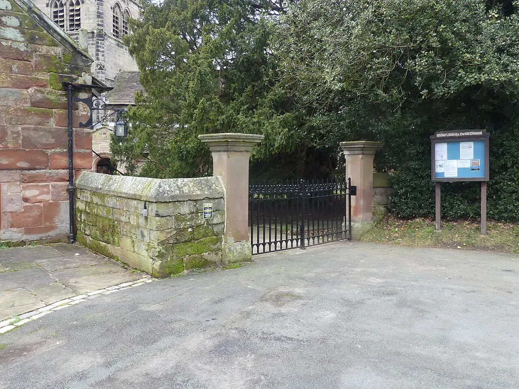 Churchyard walls, gate piers and gates, to Church of St Mary: Grade II listed building in Nether Alderley, Cheshire. .mw-parser-output .messagebox{margin:4px 0;width:auto;border-collapse:collapse;border:2px solid var(--border-color-progressive,#6485d1);background-color:var(--background-color-neutral-subtle,#fbfcff);color:var(--color-base,#202122);box-sizing:border-box;border-inline-start-width:8px}.mw-parser-output .messagebox.mbox-small{font-size:88%;line-height:1.25em}.mw-parser-output .mbox-warning,.mw-parser-output .mbox-speedy{border:2px solid var(--border-color-error,#b22222);background:var(--background-color-error-subtle,#ffdbdb);border-inline-start-width:8px}.mw-parser-output .mbox-serious,.mw-parser-output .mbox-delete,.mw-parser-output .mbox-stop{border:2px solid var(--border-color-error,#b22222);border-inline-start-width:8px}.mw-parser-output .mbox-issue,.mw-parser-output .mbox-content{border:2px solid #f28500;background:var(--background-color-warning-subtle,#ffe);border-inline-start-width:8px}.mw-parser-output .mbox-query,.mw-parser-output .mbox-style{border:2px solid #f4c430;background:var(--background-color-warning-subtle,#ffe);border-inline-start-width:8px}.mw-parser-output .mbox-shit{border:2px solid #960;border-inline-start-width:8px}.mw-parser-output .mbox-license{border:2px solid #88a;border-inline-start-width:initial}.mw-parser-output .mbox-legal{border:2px solid var(--border-color-notice,#666);background:var(--background-color-base,#fff);border-inline-start-width:8px}.mw-parser-output .mbox-honor{border:2px solid #ca3;background:var(--background-color-warning-subtle,#fcf4db);border-inline-start-width:8px}.mw-parser-output .mbox-growth{border:2px solid #8d4;background:var(--background-color-success-subtle,#d5fdf4);border-inline-start-width:8px}.mw-parser-output .mbox-move{border:2px solid #93c;border-inline-start-width:8px}.mw-parser-output .mbox-protection,.mw-parser-output .mbox-message{border:2px solid var(--border-color-base,#aaa);border-inli