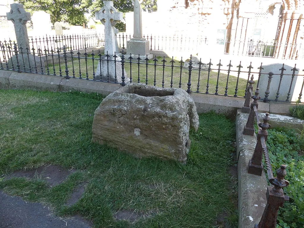 Grade II listed building on Holy Island, Northumberland: listed as "Cross base c.5 yards east of Church of St Mary". .mw-parser-output .messagebox{margin:4px 0;width:auto;border-collapse:collapse;border:2px solid var(--border-color-progressive,#6485d1);background-color:var(--background-color-neutral-subtle,#fbfcff);color:var(--color-base,#202122);box-sizing:border-box;border-inline-start-width:8px}.mw-parser-output .messagebox.mbox-small{font-size:88%;line-height:1.25em}.mw-parser-output .mbox-warning,.mw-parser-output .mbox-speedy{border:2px solid var(--border-color-error,#b22222);background:var(--background-color-error-subtle,#ffdbdb);border-inline-start-width:8px}.mw-parser-output .mbox-serious,.mw-parser-output .mbox-delete,.mw-parser-output .mbox-stop{border:2px solid var(--border-color-error,#b22222);border-inline-start-width:8px}.mw-parser-output .mbox-issue,.mw-parser-output .mbox-content{border:2px solid #f28500;background:var(--background-color-warning-subtle,#ffe);border-inline-start-width:8px}.mw-parser-output .mbox-query,.mw-parser-output .mbox-style{border:2px solid #f4c430;background:var(--background-color-warning-subtle,#ffe);border-inline-start-width:8px}.mw-parser-output .mbox-shit{border:2px solid #960;border-inline-start-width:8px}.mw-parser-output .mbox-license{border:2px solid #88a;border-inline-start-width:initial}.mw-parser-output .mbox-legal{border:2px solid var(--border-color-notice,#666);background:var(--background-color-base,#fff);border-inline-start-width:8px}.mw-parser-output .mbox-honor{border:2px solid #ca3;background:var(--background-color-warning-subtle,#fcf4db);border-inline-start-width:8px}.mw-parser-output .mbox-growth{border:2px solid #8d4;background:var(--background-color-success-subtle,#d5fdf4);border-inline-start-width:8px}.mw-parser-output .mbox-move{border:2px solid #93c;border-inline-start-width:8px}.mw-parser-output .mbox-protection,.mw-parser-output .mbox-message{border:2px solid var(--border-color-base,#aaa);border-inli