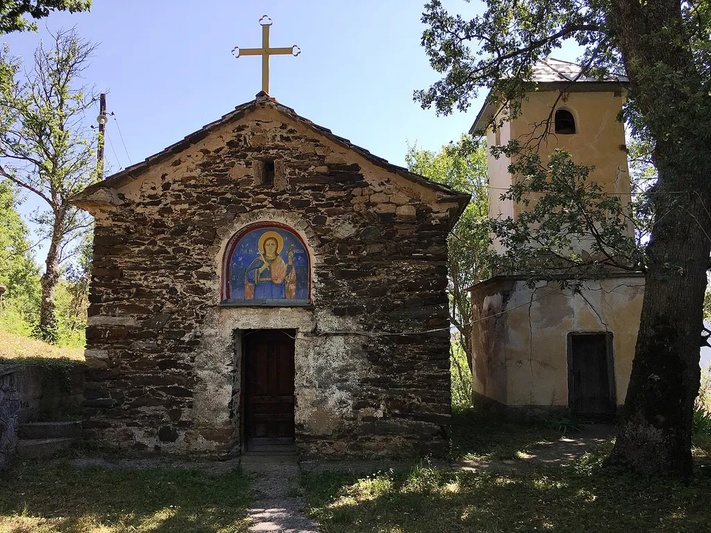 St. Thalelaeus Church (left) with the bell tower (right) in the village of Brest