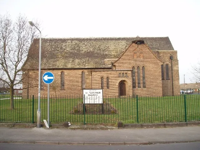St Paulinus Church New Ollerton. At the junctions of Briar Rd, Larch Rd, Yew Tree Rd, and Lime Tree Rd, St Paulinus is in the middle of a large roundabout, known locally as Church Circle