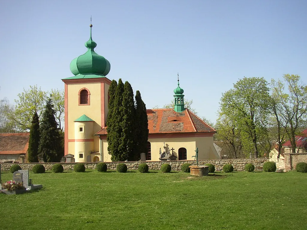 All Saints church with cemetery in Knovíz, Kladno District, Czech Republic.
