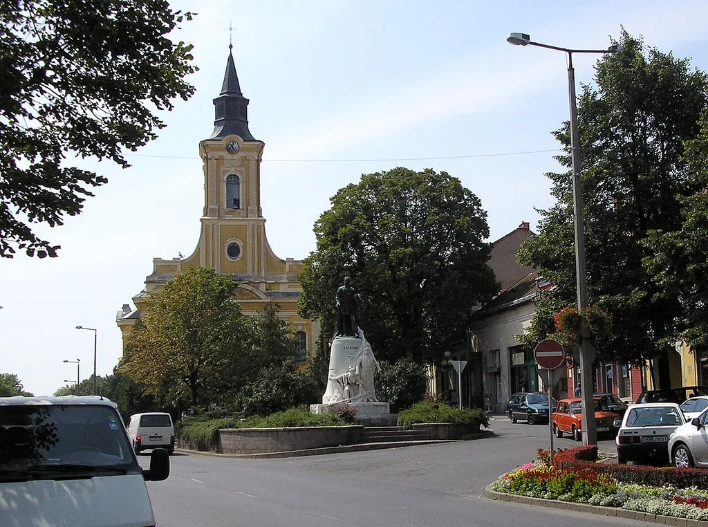 The Catholic church and the statue of Kossuth in Sátoraljaújhely (Hungary)