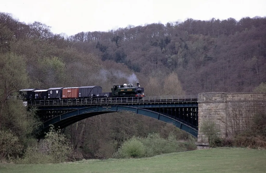 This photo is © Les Chatfield 2010. Licensed under a Creative Commons Attribution licence. 57xx Pannier tank 5764 crossing the Victoria Bridge on the SVR. The original is at www.flickr.com/photos/elsie/4323046906/ Some annoying dust marks and people removed from the original slide.