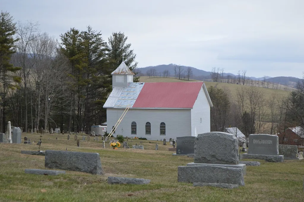 Distant view from the west of Sharon Lutheran Church, located on State Route 42 west of Ceres in Bland County, Virginia, United States. Built in 1912, it is listed on the National Register of Historic Places.