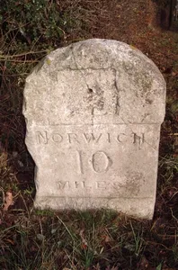 Milestone, 100m S of church