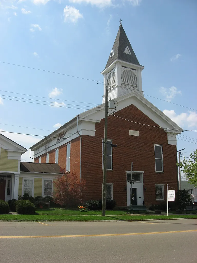 Front of the Old Methodist Church, located at 11 E. Sandusky Street in Fredericktown, Ohio, United States. Built in 1856, it is listed on the National Register of Historic Places. Once the home of the Fredericktown library, it is today the Fredericktown Historical Museum. Museum webpage.