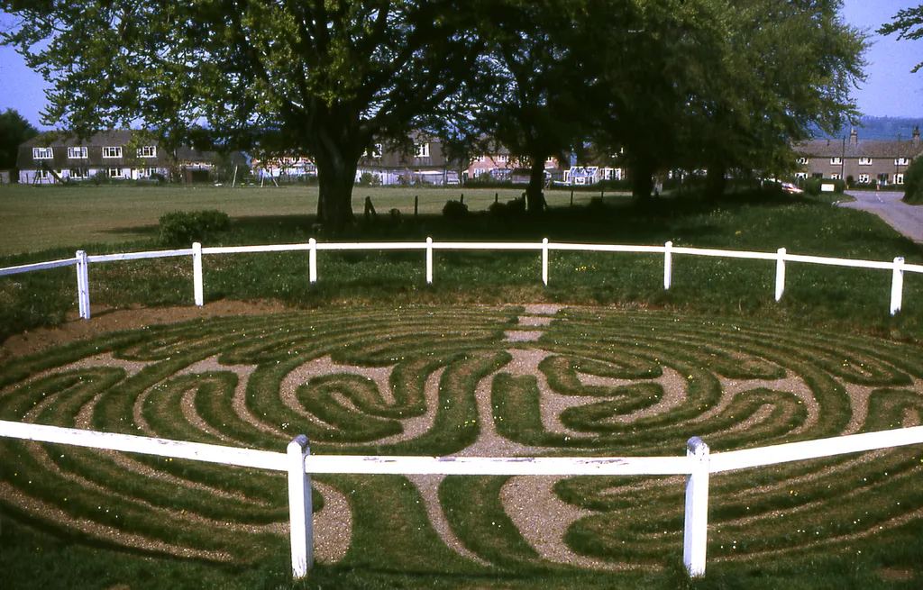 This is a scan from a transparency which I took in May 1976. It has been slightly cleaned-up in Photoshop. (The white dots in the grass are daisies!) It shows the roadside turf maze in Wing, Rutland, England. (Simon Garbutt, 8 Nov 2005) (This scan is in the Public Domain. I retain the ownership and copyright of the original transparency and any higher-resolution scans derived from it) SiGarb 18:58, 8 November 2005 (UTC)