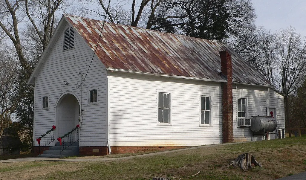 United In Faith Gospel Church, located at 235 E. Meeting Street in Dandridge, Tennessee; seen from the west. The building faces northwest.