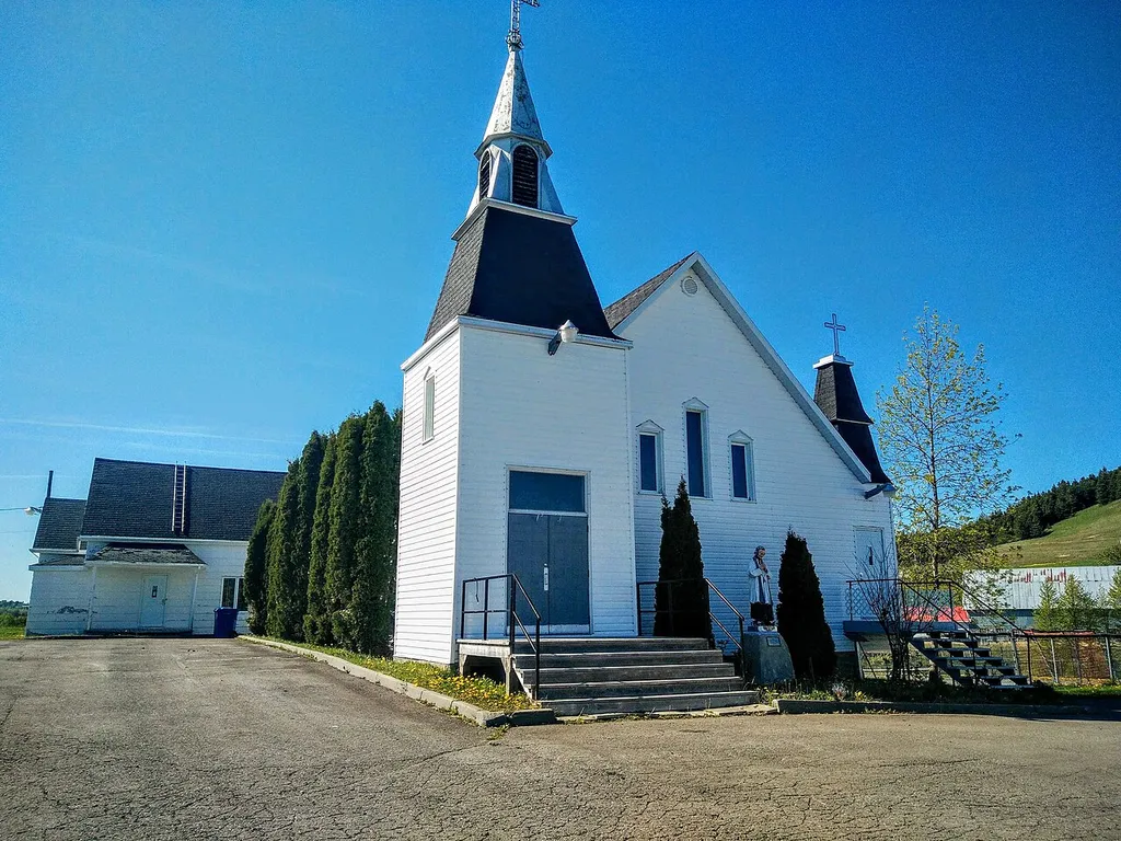 Frontside of Saint-Vianney church in Spring