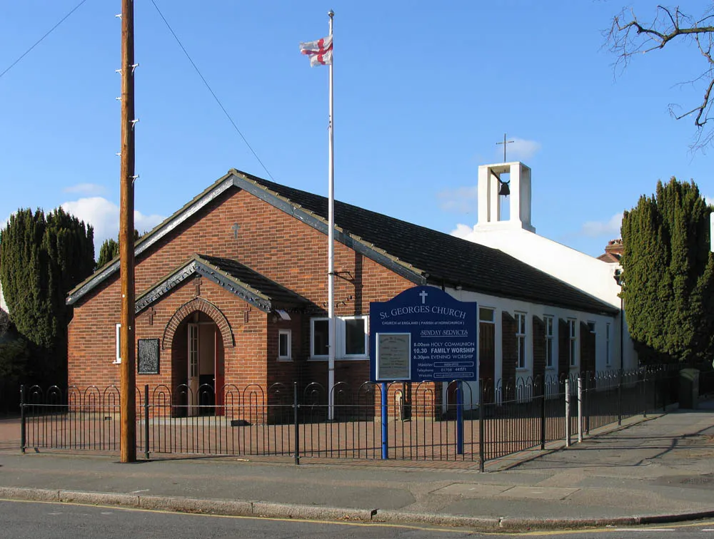 St George's parish church, Kenilworth Gardens, Hornchurch, east London (formerly Essex), seen from the southeast at the junction with Connaught Road