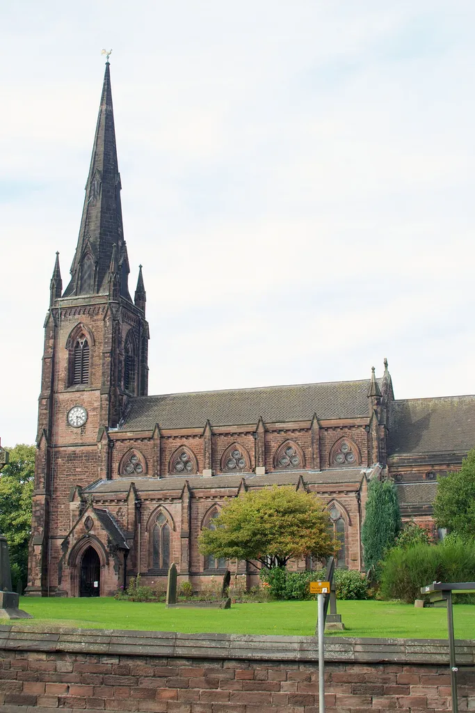 Nave, west tower and spire of Holy Trinity parish church, Hartshill, Stoke-upon-Trent, Staffordshire, seen from the south