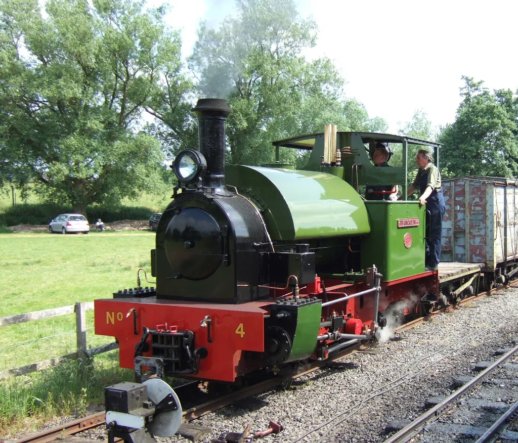 Amerton Railway. Visiting locomotive HE3902 of 1971 0-4-2ST 'Trangkil No.4'. This is the last Steam Locomotive built in the UK for Industrial use. The design is Kerr Stuart 'Brazil' class. This locomotive was used on sugar cane plantations in Java where she burned bales of sugar cane waste, repatriated she now runs on the owners private railway. 18th June 2005 Photographer - A.M.Hurrell Camera - Fuji FinePix F10 Modified - File size reduced using FinePix Software