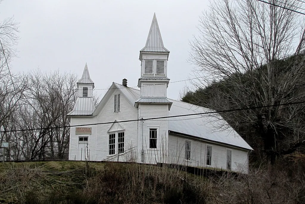 The Briceville Community Church — viewed from TN-116 at the base of the hill, in Briceville, Tennessee.