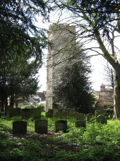 St Mary's tower and churchyard, Stony Stratford, Buckinghamshire. The tower is the only building to have survived a great fire that destroyed the lower part of the town in 1742.