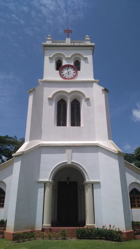 Front view of St. Paul's Church, Mangalore, shot from below on a mobile phone.