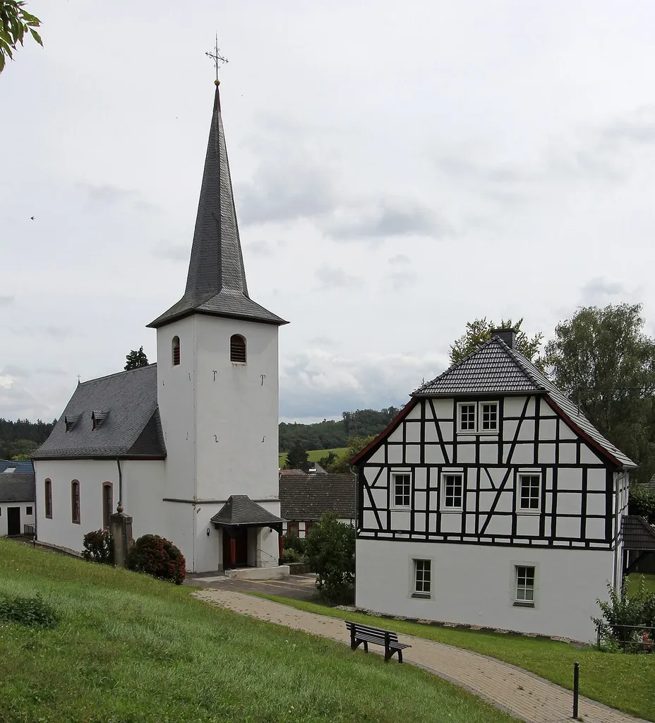 Neukirchen (Rheinbach), Neukirchener street 16, catholic parish church “Saint Margaretha” and parish house backside