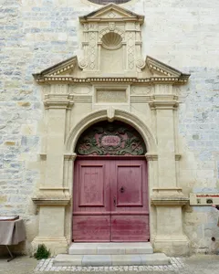 Portal of St. Adrian church in Caveirac (Gard)