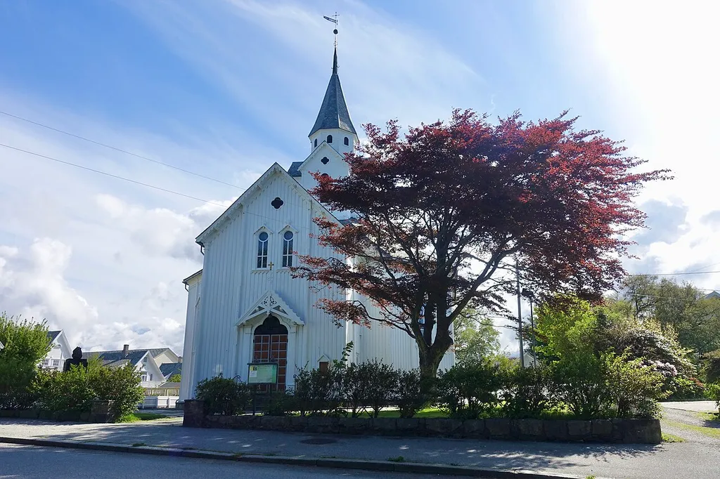 Skåre Church (Norwegian: Skåre kirke), a parish church build 1858 in the town of Haugesund, Norway. Photo taken on a sunny morning in June 2020.