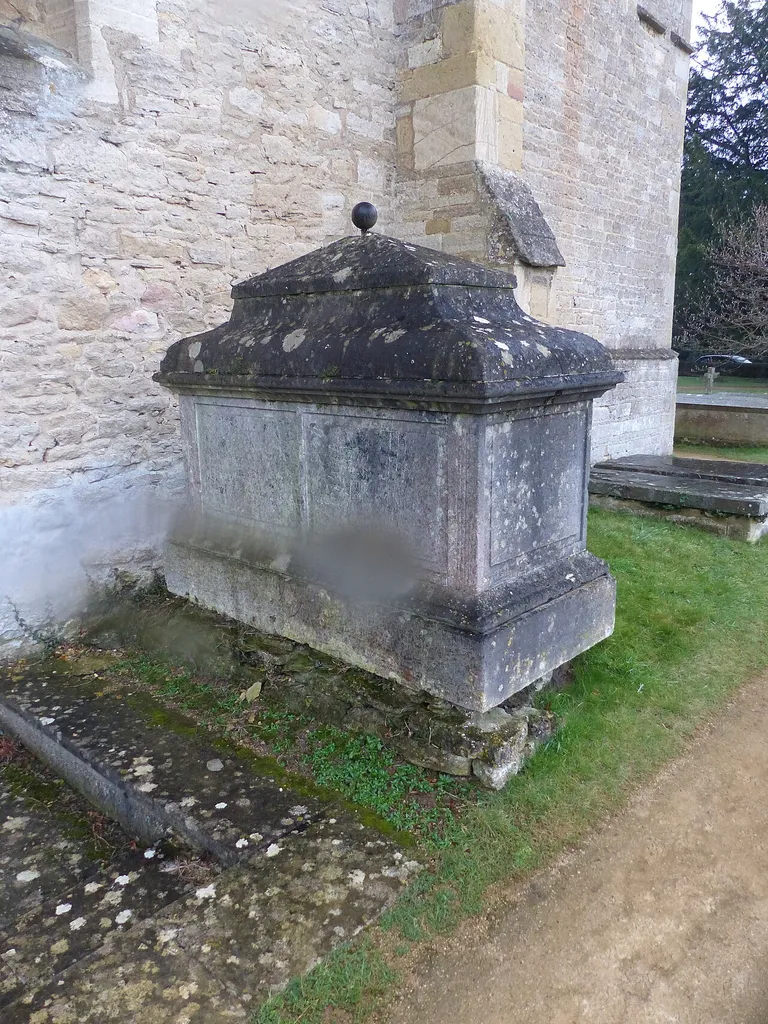 Chest tomb approximately 1/2 metre west of Church of St Mary, Kidlington, Oxfordshire. .mw-parser-output .messagebox{margin:4px 0;width:auto;border-collapse:collapse;border:2px solid var(--border-color-progressive,#6485d1);background-color:var(--background-color-neutral-subtle,#fbfcff);color:var(--color-base,#202122);box-sizing:border-box;border-inline-start-width:8px}.mw-parser-output .messagebox.mbox-small{font-size:88%;line-height:1.25em}.mw-parser-output .mbox-warning,.mw-parser-output .mbox-speedy{border:2px solid var(--border-color-error,#b22222);background:var(--background-color-error-subtle,#ffdbdb);border-inline-start-width:8px}.mw-parser-output .mbox-serious,.mw-parser-output .mbox-delete,.mw-parser-output .mbox-stop{border:2px solid var(--border-color-error,#b22222);border-inline-start-width:8px}.mw-parser-output .mbox-issue,.mw-parser-output .mbox-content{border:2px solid #f28500;background:var(--background-color-warning-subtle,#ffe);border-inline-start-width:8px}.mw-parser-output .mbox-query,.mw-parser-output .mbox-style{border:2px solid #f4c430;background:var(--background-color-warning-subtle,#ffe);border-inline-start-width:8px}.mw-parser-output .mbox-shit{border:2px solid #960;border-inline-start-width:8px}.mw-parser-output .mbox-license{border:2px solid #88a;border-inline-start-width:initial}.mw-parser-output .mbox-legal{border:2px solid var(--border-color-notice,#666);background:var(--background-color-base,#fff);border-inline-start-width:8px}.mw-parser-output .mbox-honor{border:2px solid #ca3;background:var(--background-color-warning-subtle,#fcf4db);border-inline-start-width:8px}.mw-parser-output .mbox-growth{border:2px solid #8d4;background:var(--background-color-success-subtle,#d5fdf4);border-inline-start-width:8px}.mw-parser-output .mbox-move{border:2px solid #93c;border-inline-start-width:8px}.mw-parser-output .mbox-protection,.mw-parser-output .mbox-message{border:2px solid var(--border-color-base,#aaa);border-inline-start-width:8px}.mw-parser-