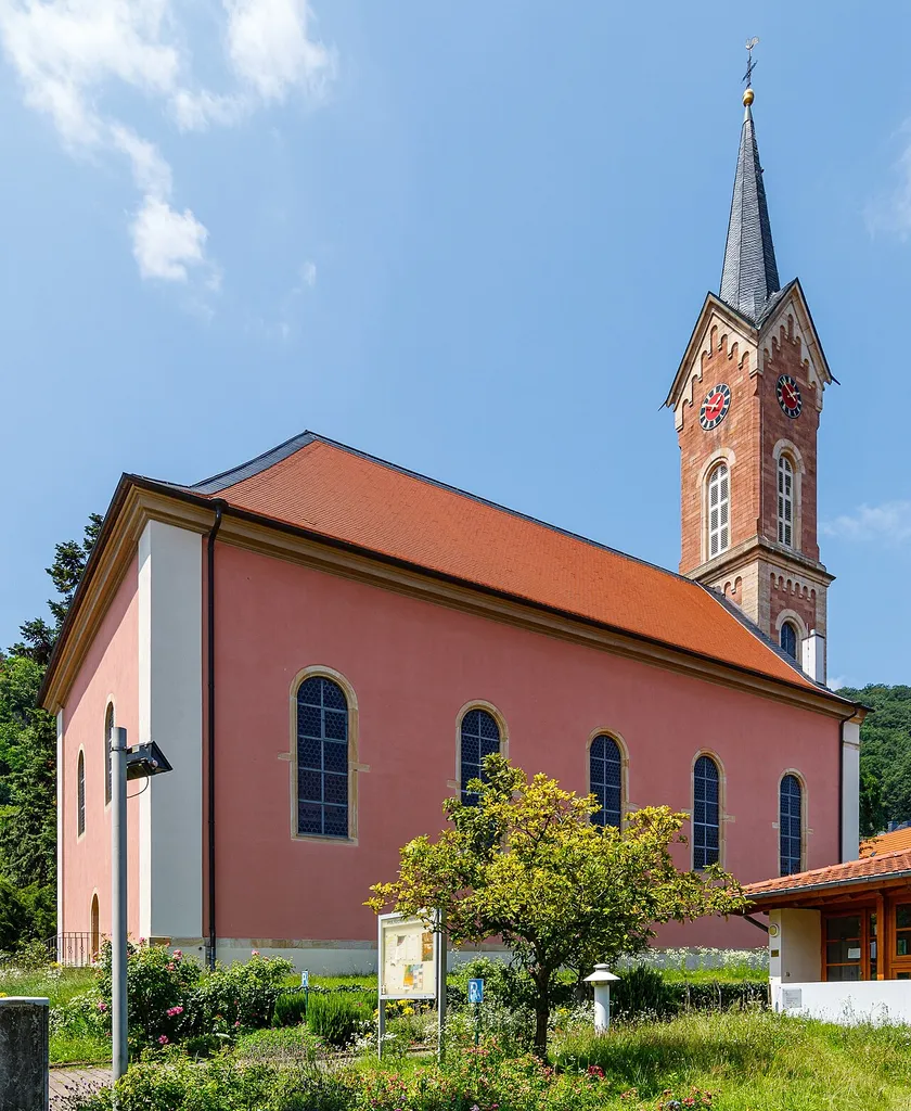 This is a photograph of a cultural monument.It is on the list of cultural monuments of Haardt an der Weinstraße. church building: Protestant Church Title Protestant Church Instance of church building Located in the administrative territorial entity Neustadt an der Weinstraße Designation: Protestant Church Depicted part: View from east Construction time: 1781/82 Description:Late Baroque rectangular hall building with hip roof Neo-Romanesque tower designated 1867 with equipment Place: Quarter Haardt an der Weinstraße, Neustadt an der Weinstraße, Rhineland-Palatinate, Germany, Europe Location: Mandelring House number: 58