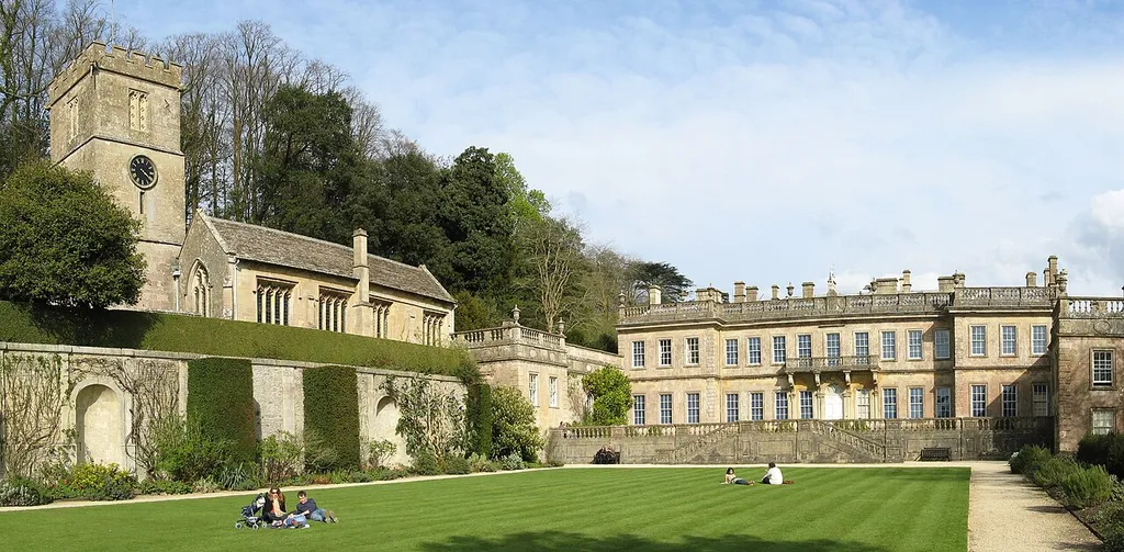 West side of Dyrham Park house and St Peter's Church, from west lawn.