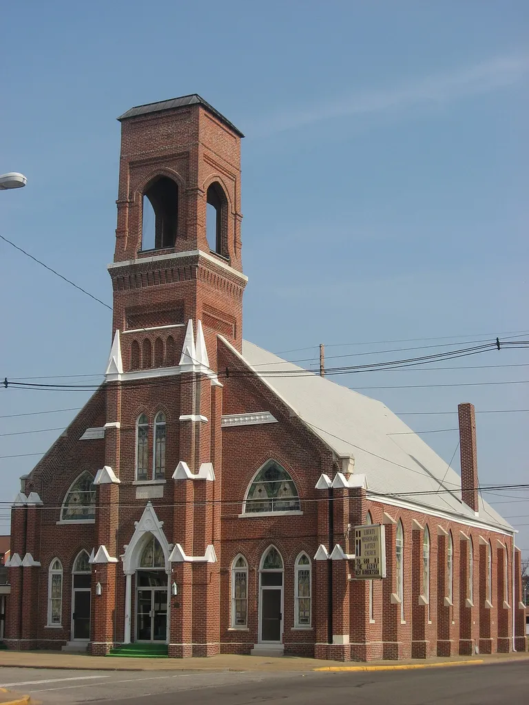 Front and western side of Liberty Missionary Baptist Church, located at 701 Oak Street in Evansville, Indiana, United States. Built in 1887, it is listed on the National Register of Historic Places.