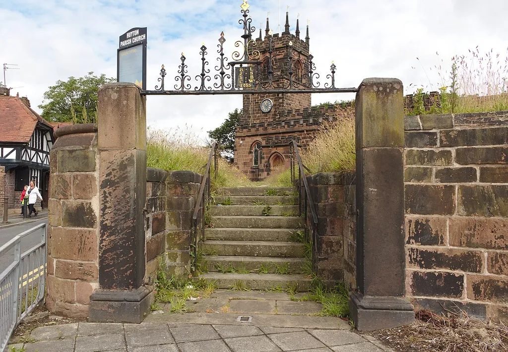 Grade II listed gateway to St Michael's Church, Huyton, at the southern end of the churchyard.