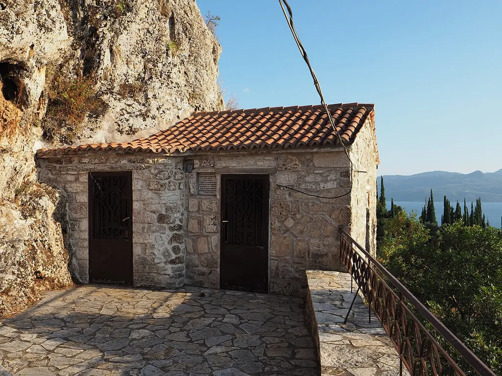 The cave church of Panagia Eleousa in Myrtia, Aetoloacarnania, overlooking Trichonida Lake.