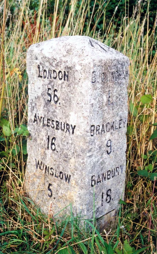 Milestone, London Road; Tesco's roundabout, S of Buckingham by-pass