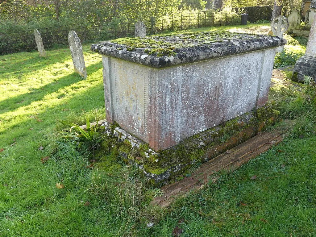 One of numerous listed table tombs in the churchyard of St Mary's Church, Monxton. Listed as "Table tomb 12 metres south of St Mary's Church". .mw-parser-output .messagebox{margin:4px 0;width:auto;border-collapse:collapse;border:2px solid var(--border-color-progressive,#6485d1);background-color:var(--background-color-neutral-subtle,#fbfcff);color:var(--color-base,#202122);box-sizing:border-box;border-inline-start-width:8px}.mw-parser-output .messagebox.mbox-small{font-size:88%;line-height:1.25em}.mw-parser-output .mbox-warning,.mw-parser-output .mbox-speedy{border:2px solid var(--border-color-error,#b22222);background:var(--background-color-error-subtle,#ffdbdb);border-inline-start-width:8px}.mw-parser-output .mbox-serious,.mw-parser-output .mbox-delete,.mw-parser-output .mbox-stop{border:2px solid var(--border-color-error,#b22222);border-inline-start-width:8px}.mw-parser-output .mbox-issue,.mw-parser-output .mbox-content{border:2px solid #f28500;background:var(--background-color-warning-subtle,#ffe);border-inline-start-width:8px}.mw-parser-output .mbox-query,.mw-parser-output .mbox-style{border:2px solid #f4c430;background:var(--background-color-warning-subtle,#ffe);border-inline-start-width:8px}.mw-parser-output .mbox-shit{border:2px solid #960;border-inline-start-width:8px}.mw-parser-output .mbox-license{border:2px solid #88a;border-inline-start-width:initial}.mw-parser-output .mbox-legal{border:2px solid var(--border-color-notice,#666);background:var(--background-color-base,#fff);border-inline-start-width:8px}.mw-parser-output .mbox-honor{border:2px solid #ca3;background:var(--background-color-warning-subtle,#fcf4db);border-inline-start-width:8px}.mw-parser-output .mbox-growth{border:2px solid #8d4;background:var(--background-color-success-subtle,#d5fdf4);border-inline-start-width:8px}.mw-parser-output .mbox-move{border:2px solid #93c;border-inline-start-width:8px}.mw-parser-output .mbox-protection,.mw-parser-output .mbox-message{border:2px solid var(--border-co