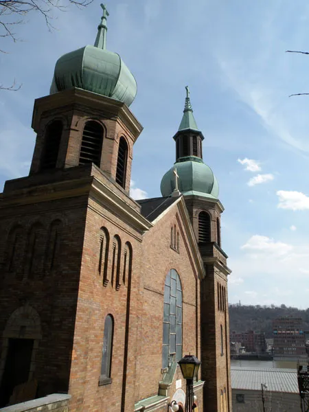Picture of the old Saint Nicholas Croatian Catholic Church located at 1326 East Ohio Street in the Troy Hill neighborhood of Pittsburgh, Pennsylvania, on March 20, 2010. The church was established in 1894, and is the site of the first Croatian Catholic Parish in America. The church, as pictured, was built from 1900 to 1904, and is on the List of Pittsburgh Landmarks recognized by the Pittsburgh History and Landmarks Foundation (PHLF). Architect: Frederick C. Sauer (1860–1942). The congregation later moved to St. Nicholas Croatian Church in Millvale, Pennsylvania, where it is currently located. That church was built in 1900, and the architect was also Frederick C. Sauer.