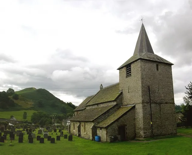 St Mary the Virgin, Gladestry With Yew Tree Bank in the background.