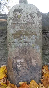 Milestone, Sawley Road, by Christ Church wall