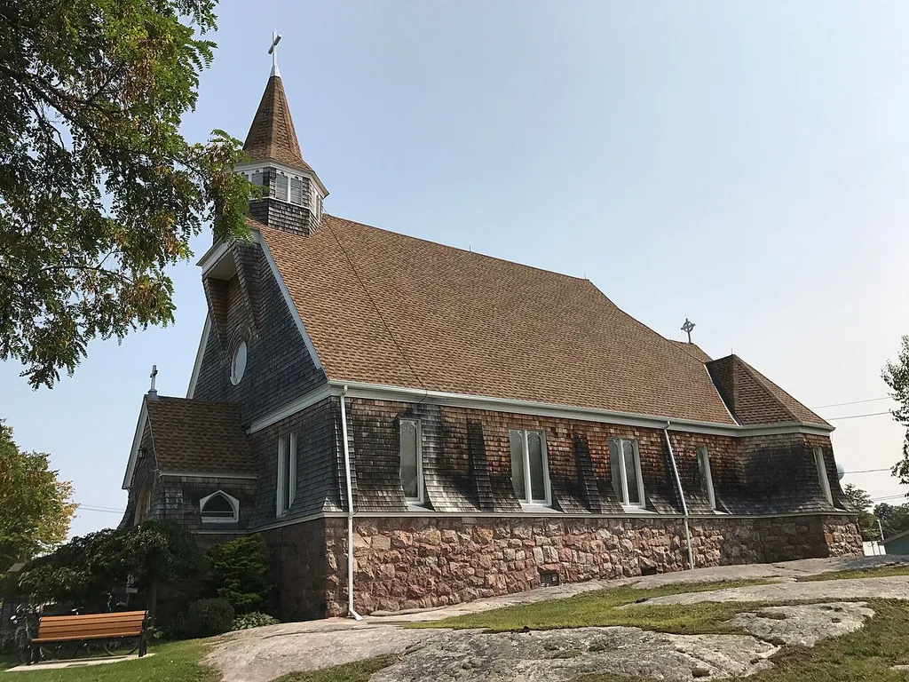 Church of Saint Lawrence (Episcopal) in Alexandria Bay, New York. This is an image of a place or building that is listed on the National Register of Historic Places in the United States of America. Its reference number is 97000442 (Wikidata).