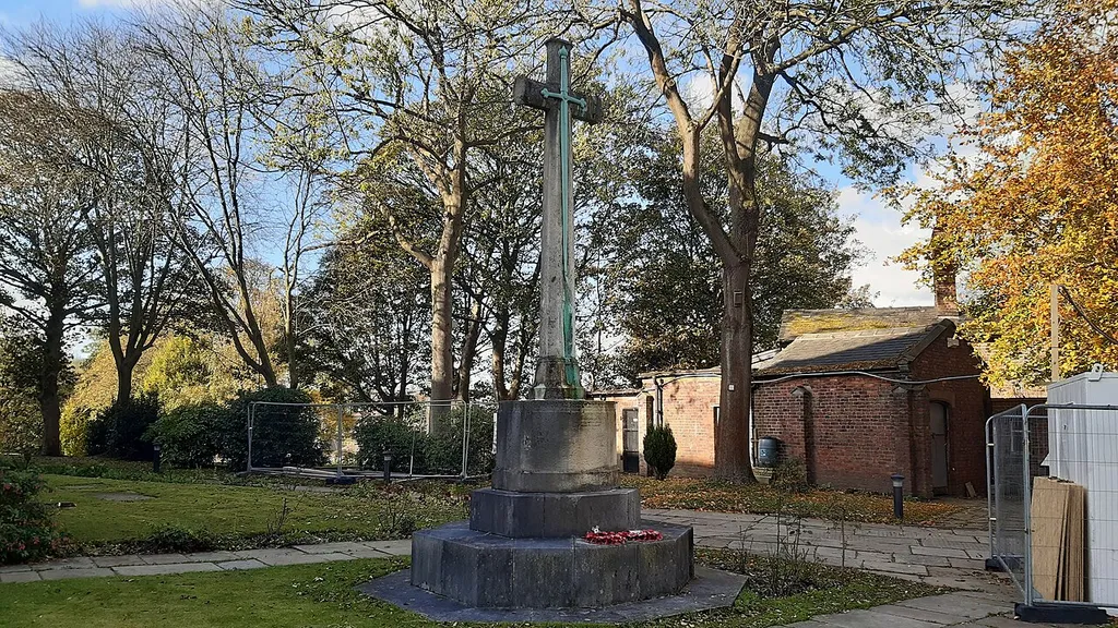 This is War memorial, St. Mary's churchyard, a listed building in Prestwich, Greater Manchester