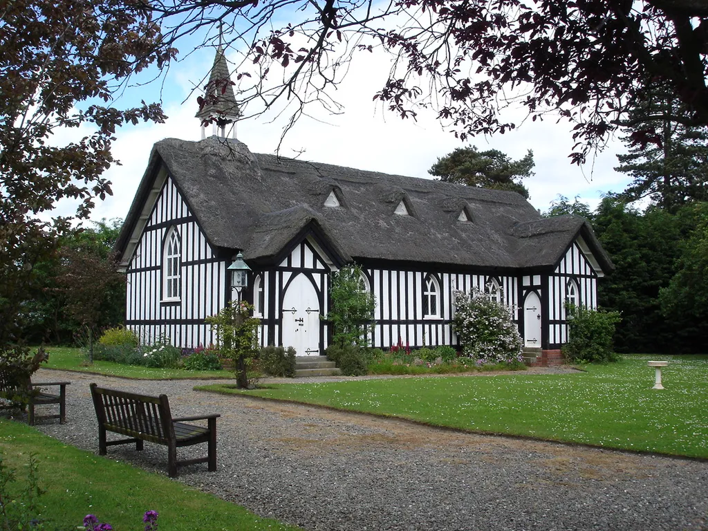 All Saints Church built in 1903. Construction is timber with a thatched roof.