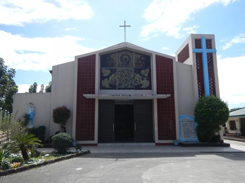 Our Lady of the Most Holy Rosary Parish Church, Oct. 7 Parish Priest: Rev. Fr. Cesar M. Bactol Vicariate of St. John Nepomucene in Barangay Calaba, San Isidro, Nueva Ecija Welcome Arch, Barangay Hall scenery.