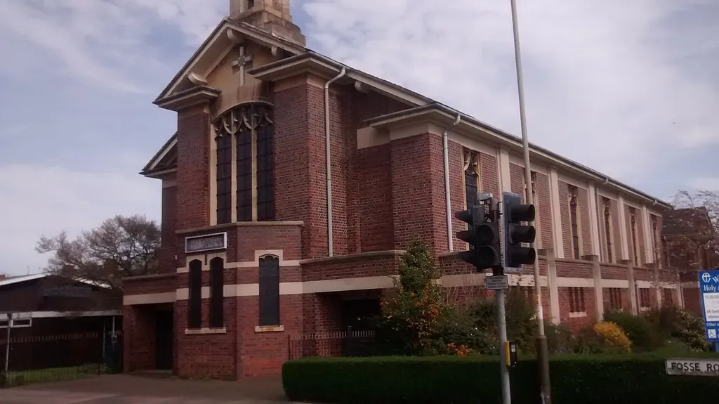 Parish church of the Holy Apostles, Imperial Avenue, Leicester, seen from the west from the crosroads with Fosse Road South