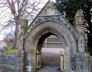 Lychgate and Boundary Wall to Saint John's Churchyard