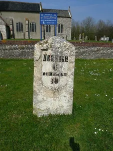 Milestone, by wall to St Peter's churchyard